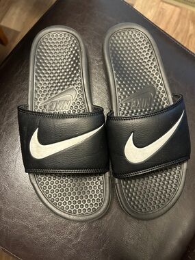 Nike Black Slides with White Swoosh Logo